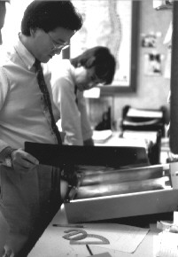 Dr. Wong looking at X-rays scene