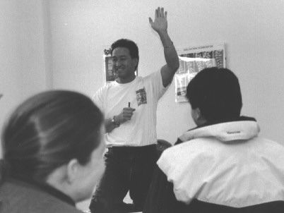 Dr. Wong lecturing at the clinic